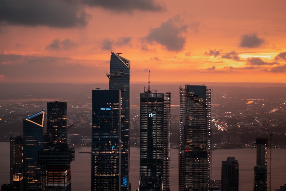 a view of a city skyline at sunset