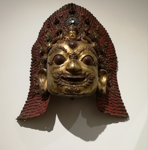 Ancient mask from the Baoulé region, representing cultural artistry and ancestral spirits.