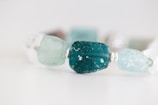 a close up of a bracelet made of glass beads