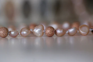 a close up of a row of pearls