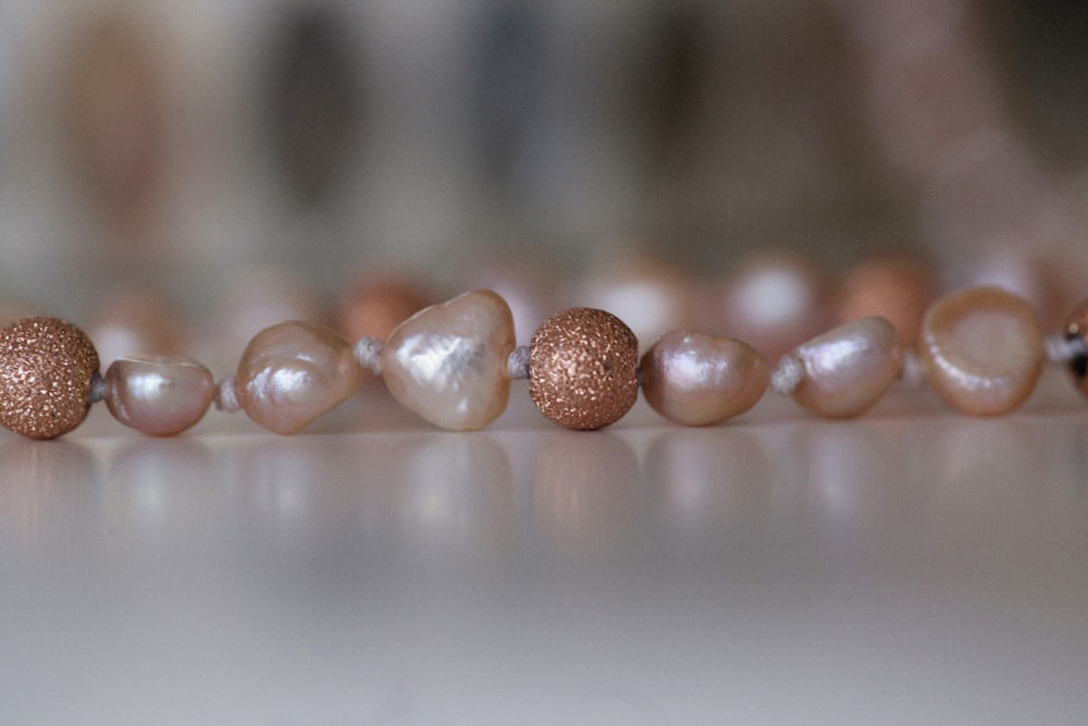 a close up of a row of pearls