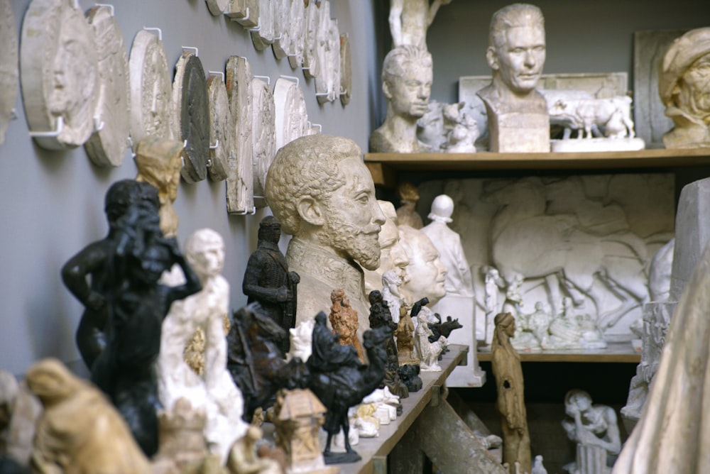 a room filled with lots of different types of statues