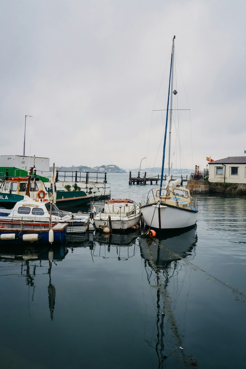 a group of boats that are sitting in the water