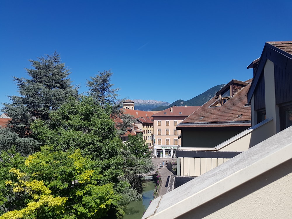 a view of some buildings and a river