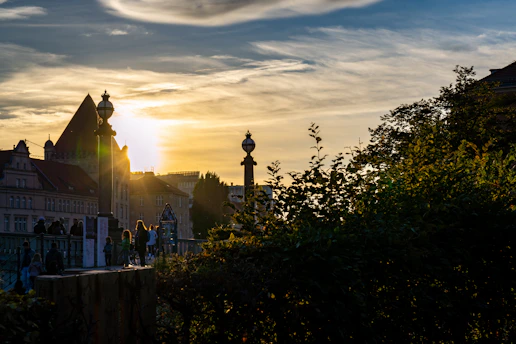 A scenic view of a famous international landmark at sunset with vibrant colors.