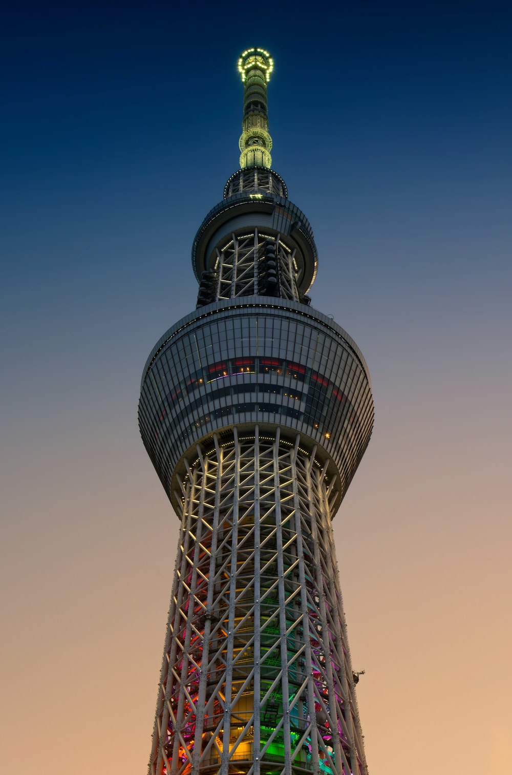 a tall tower with a clock on the top of it