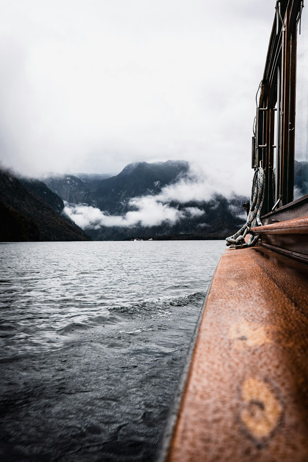 a view of a body of water with mountains in the background