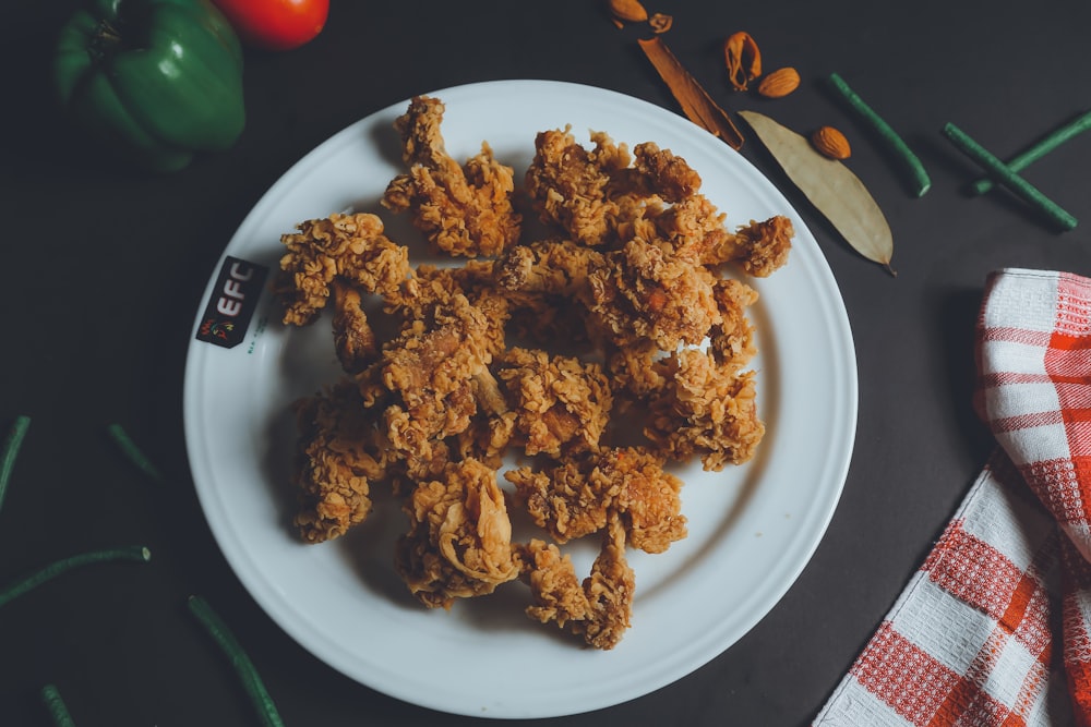 a plate of fried chicken on a table