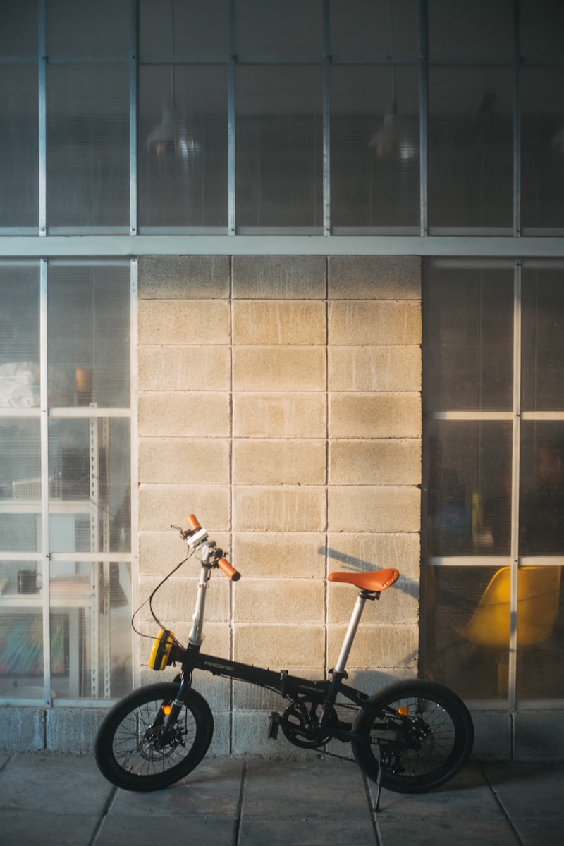 Folding bike parked outside urban building