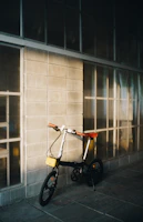 Photo showing the bike's compact size fitting neatly in a home gym corner.