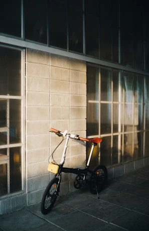Photo showing the bike's compact size fitting neatly in a home gym corner.