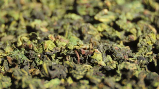 Close-up of bulk black tea leaves in large sacks ready for wholesale distribution
