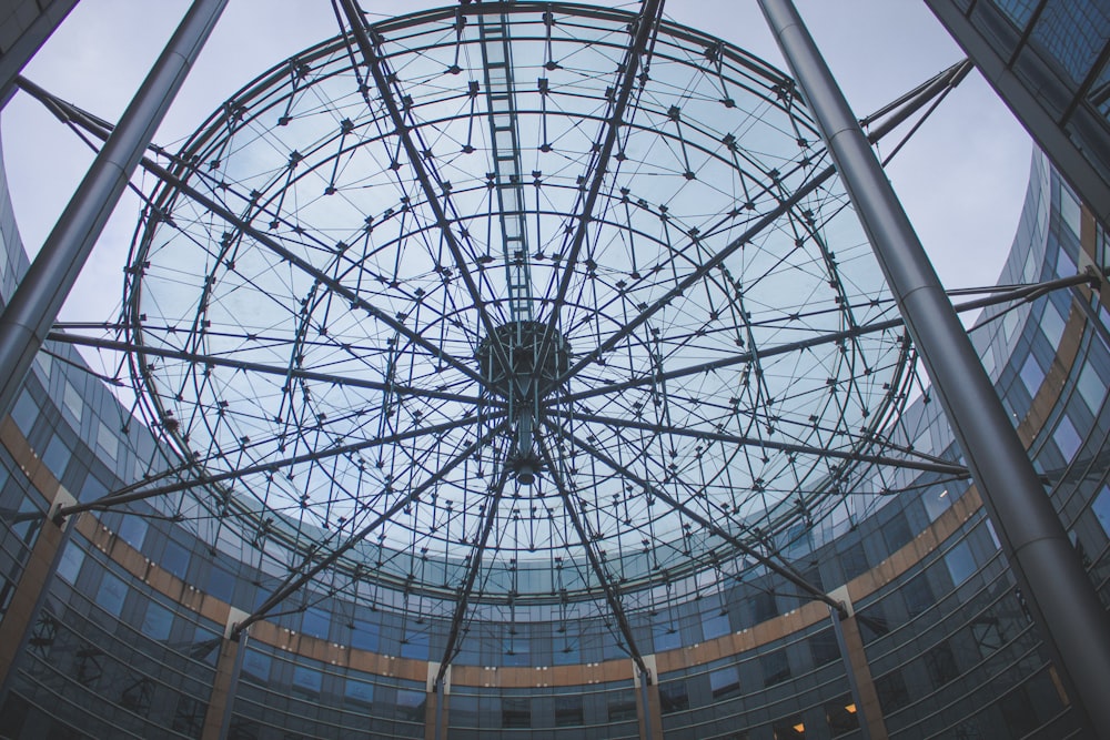a large glass dome with a clock on top of it