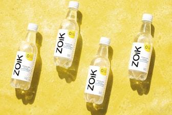 three bottles of water sitting next to each other