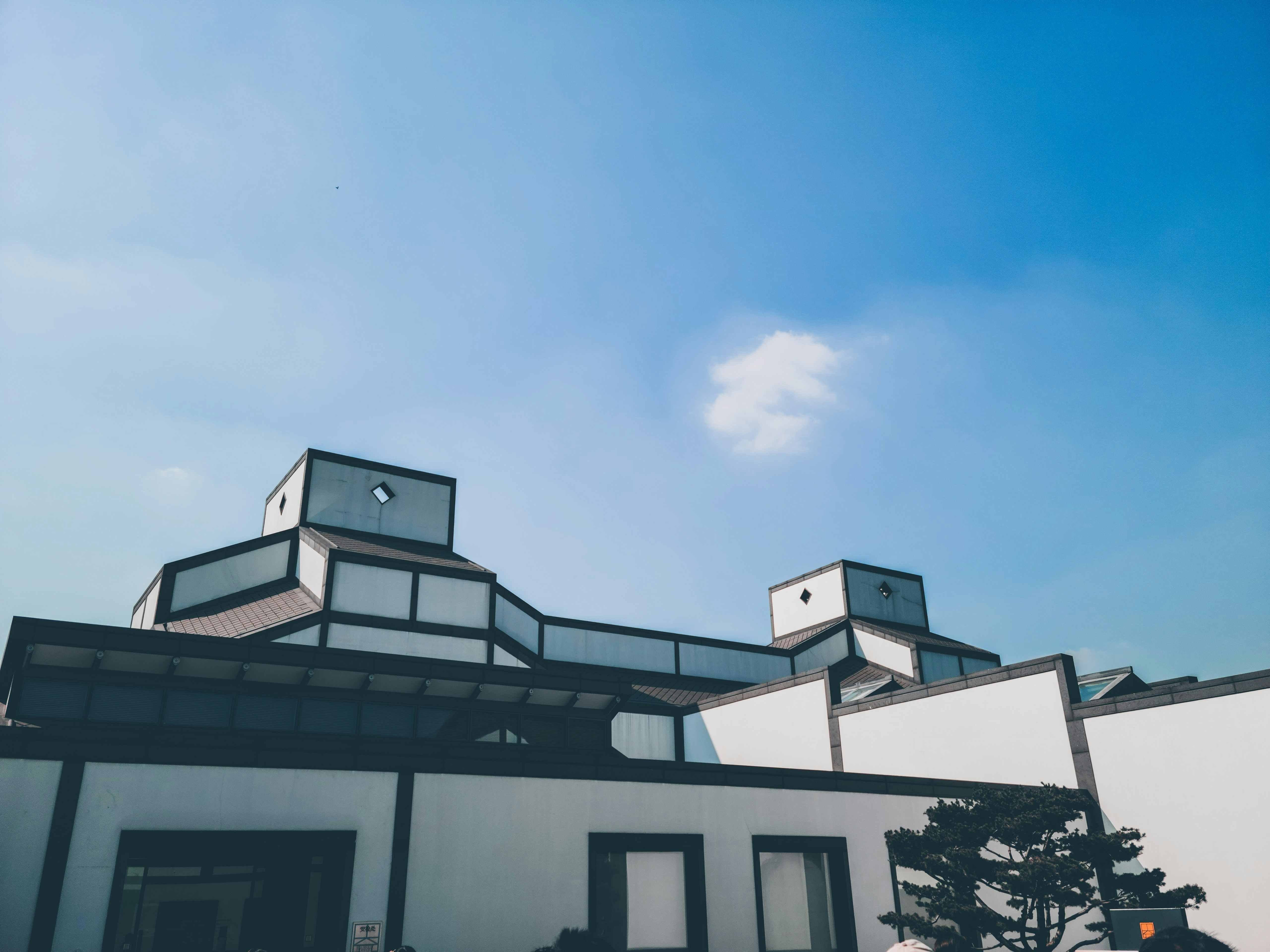 a building with a clock on the top of it