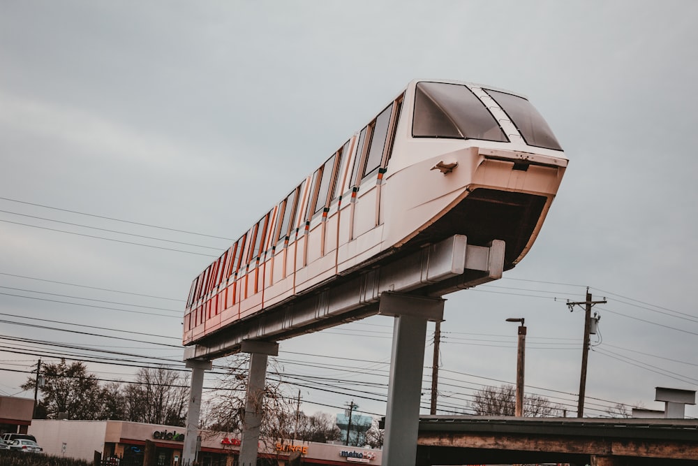 a train on a train track going over a bridge