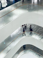 a group of people walking down a set of stairs