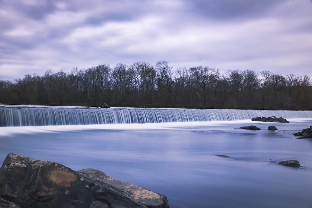 a long exposure photo of a waterfall