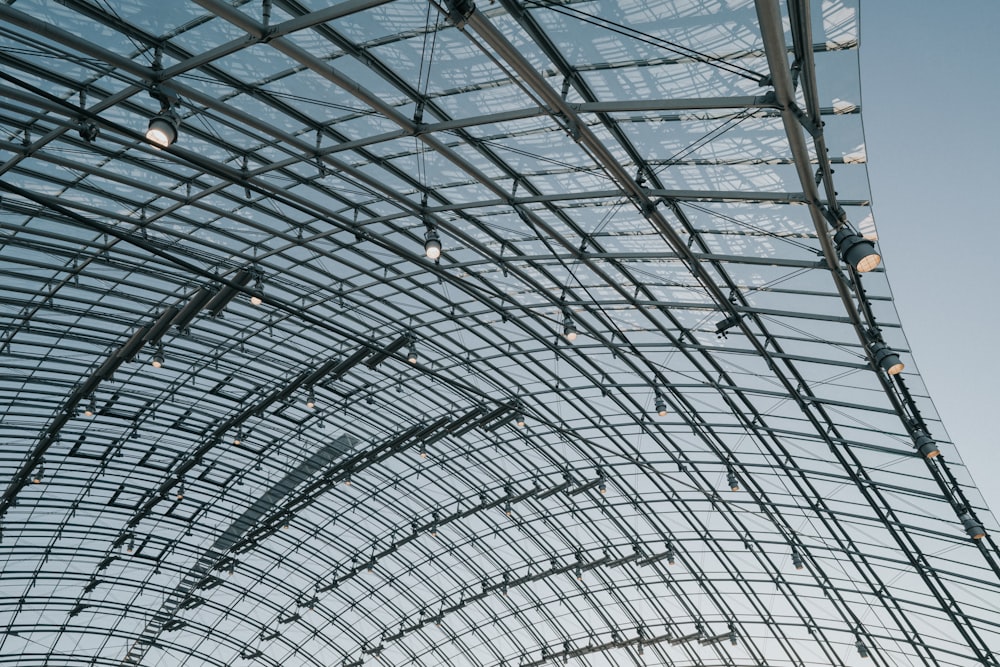 a large metal structure with a sky background