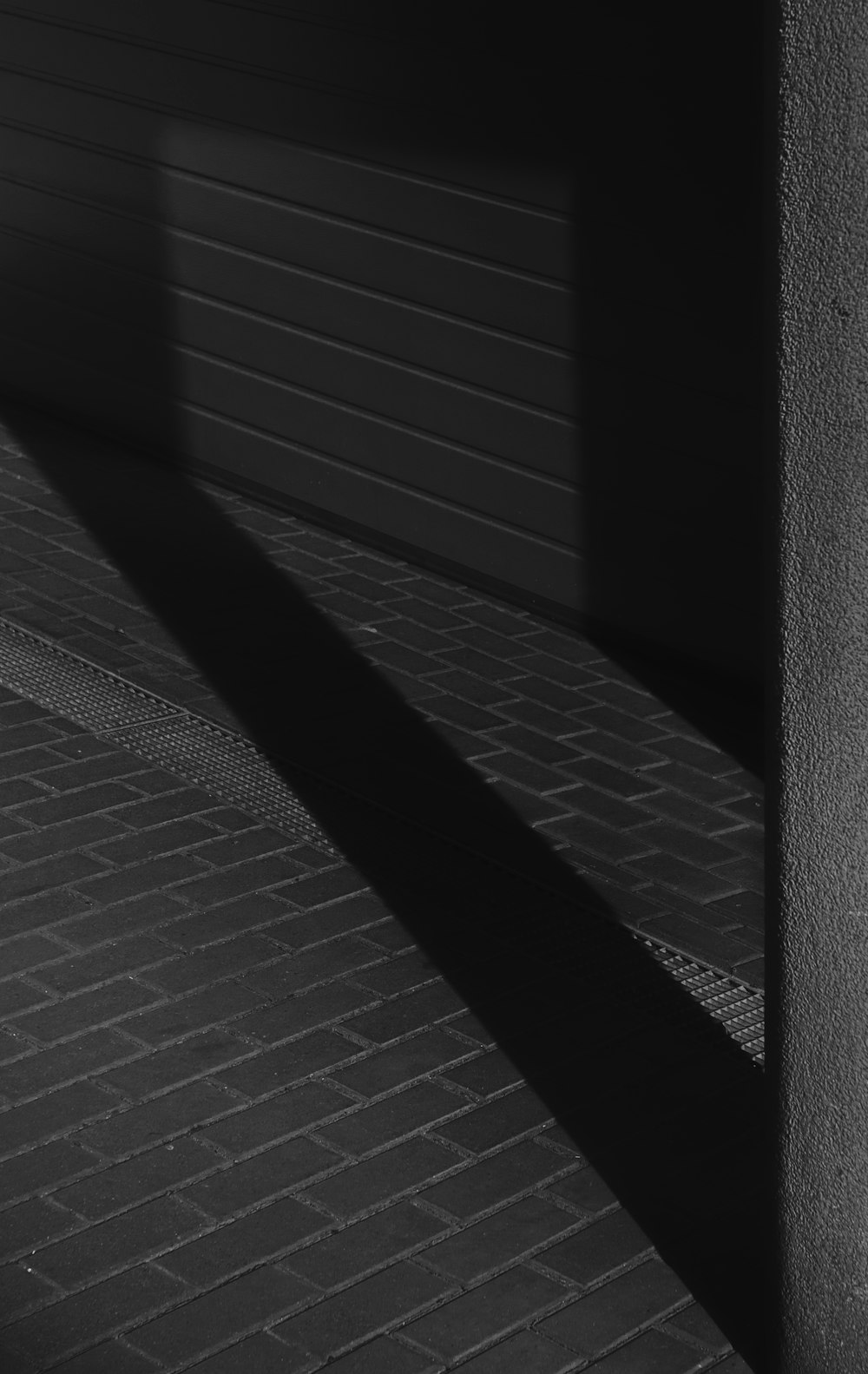 a black and white photo of a person on a skateboard