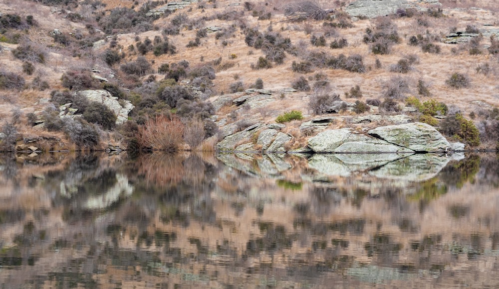 a mountain with a body of water in it