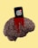 A brain is depicted with a smartphone embedded in it, where the phone displays a notification icon with 99+ alerts. Red paint or liquid is dripping from where the phone is inserted, creating a dramatic and intense visual.