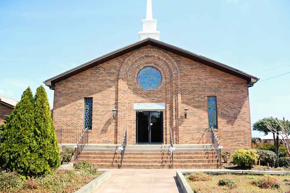 a church with a steeple and a steeple on top of it