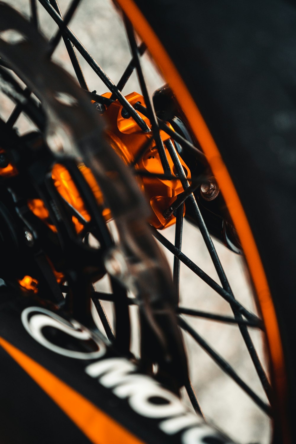 a close up of the spokes of a bicycle