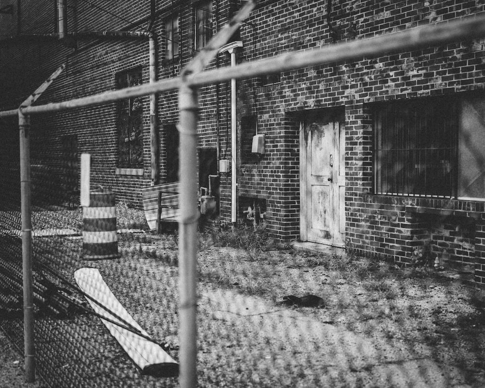 a black and white photo of a brick building