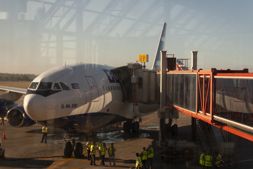 a large jetliner sitting on top of an airport tarmac