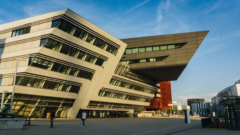 a large building with a lot of windows on top of it