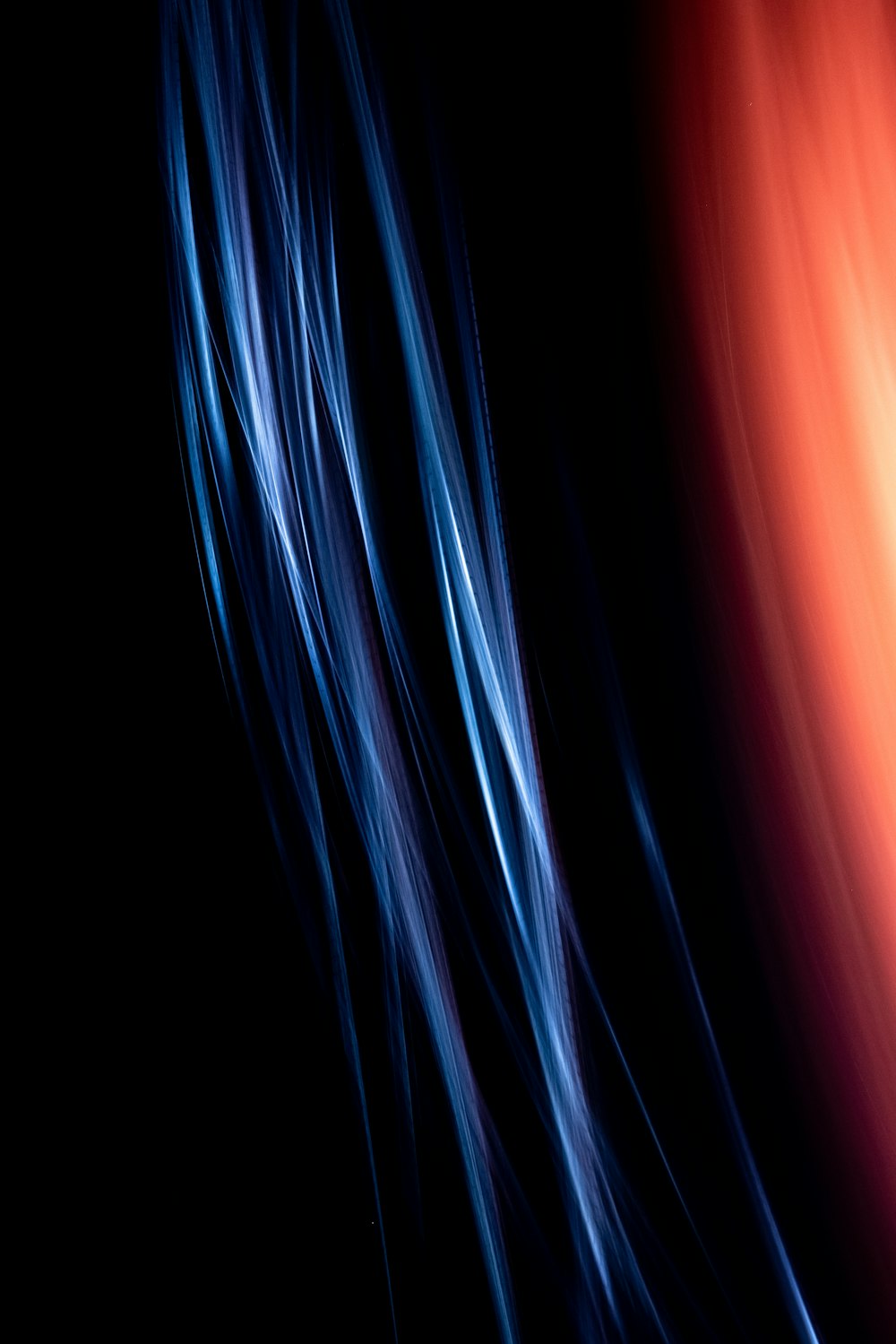 a black background with red and blue lines