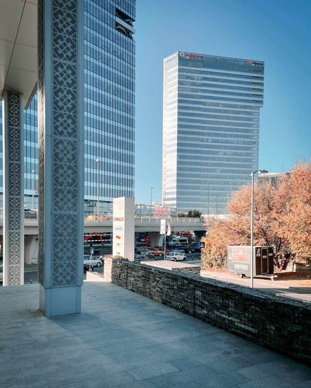 a view of a city with tall buildings in the background