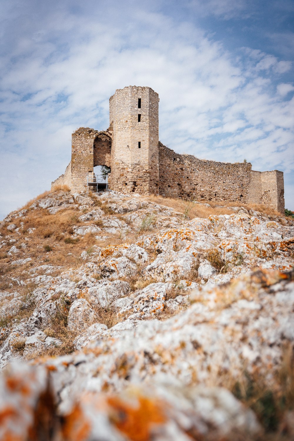 a castle on top of a rocky hill