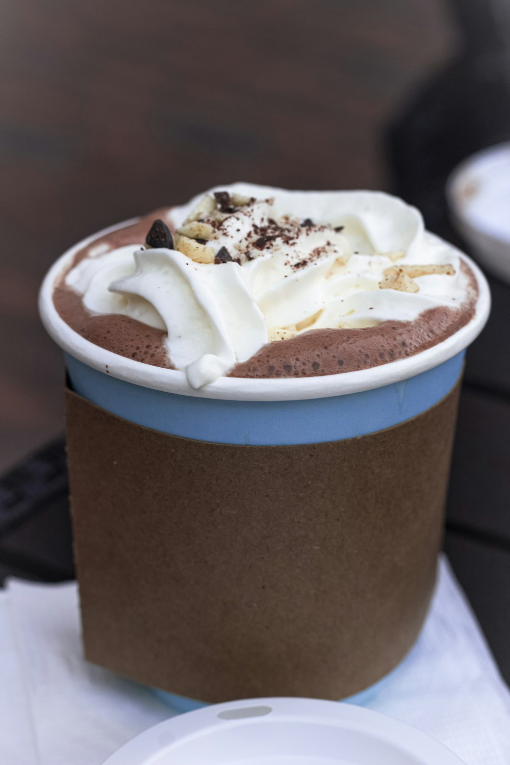 a cup of hot chocolate with whipped cream on top