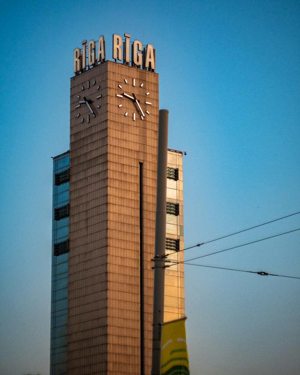 a tall building with a clock on the top of it