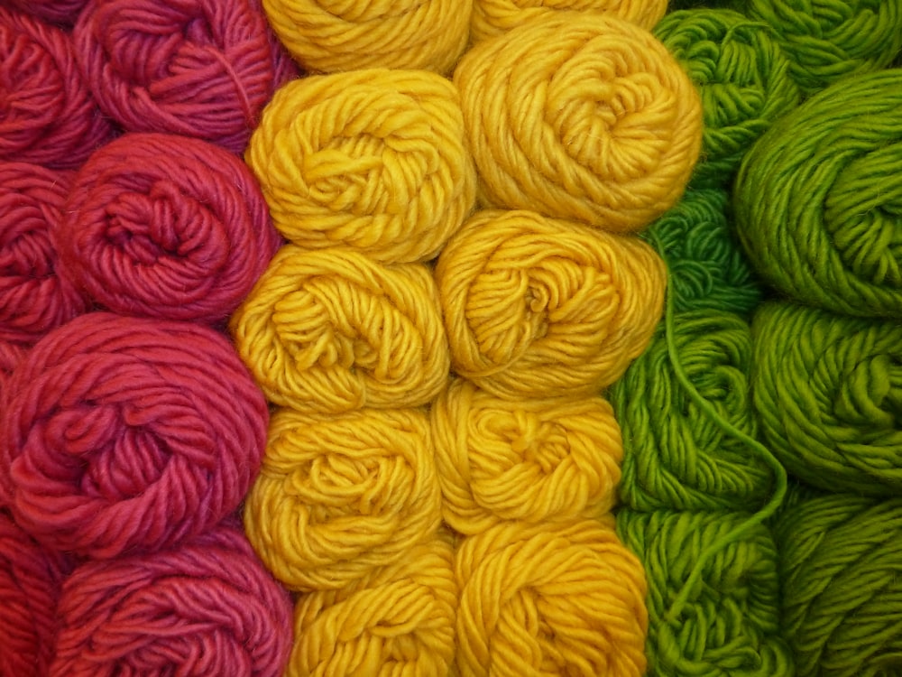 a close up of a bunch of balls of yarn