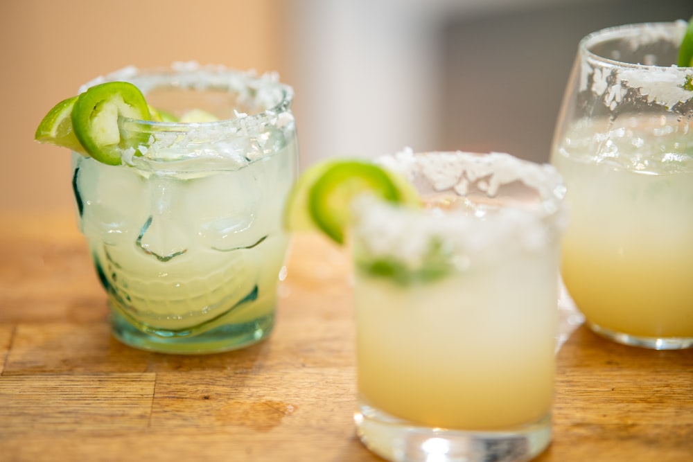 three different types of alcoholic drinks on a table