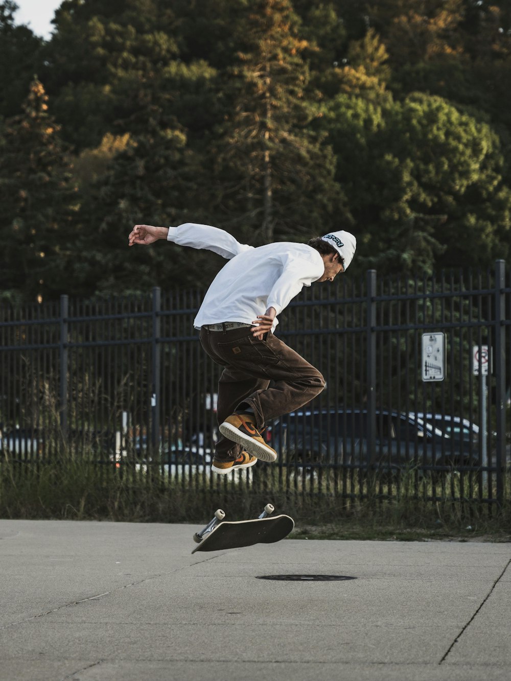 a man flying through the air while riding a skateboard
