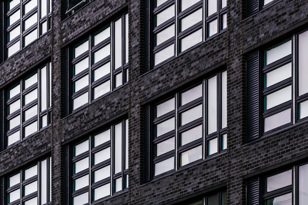 a large building with many windows and a clock