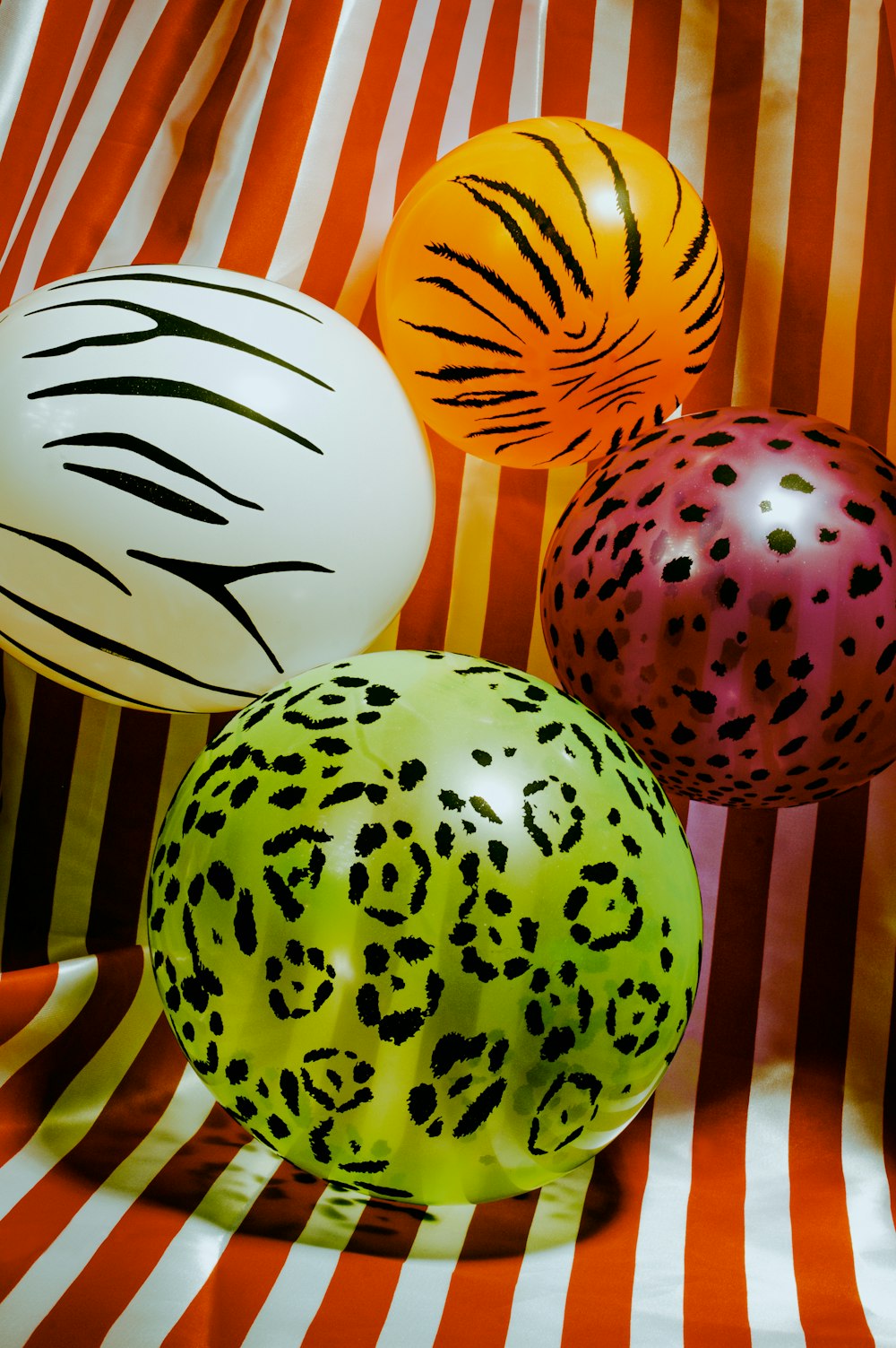 a group of three balls sitting on top of a table