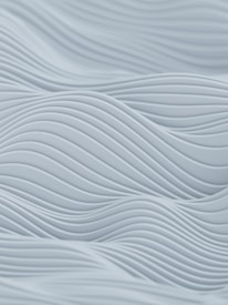 Wavy, smooth, and layered patterns create a sense of gentle motion and depth. The design features soft, repetitive curves that create an abstract and minimalistic aesthetic.