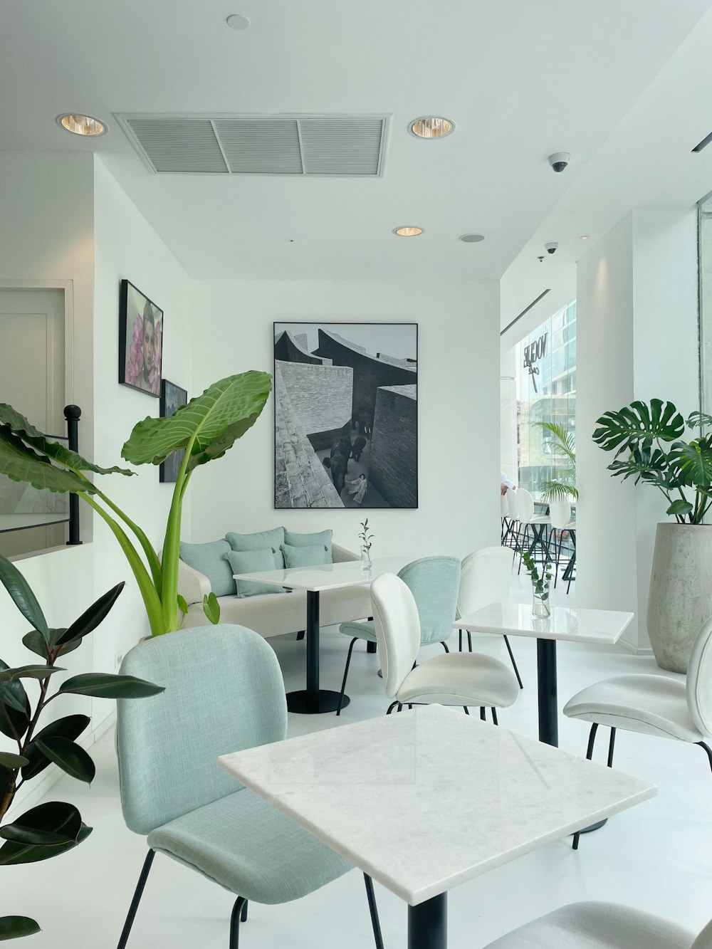 a living room filled with furniture and a table