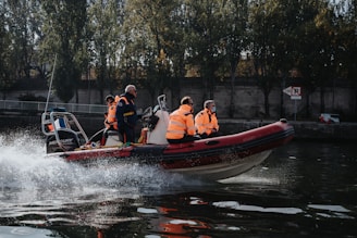 a group of people riding on the back of a boat