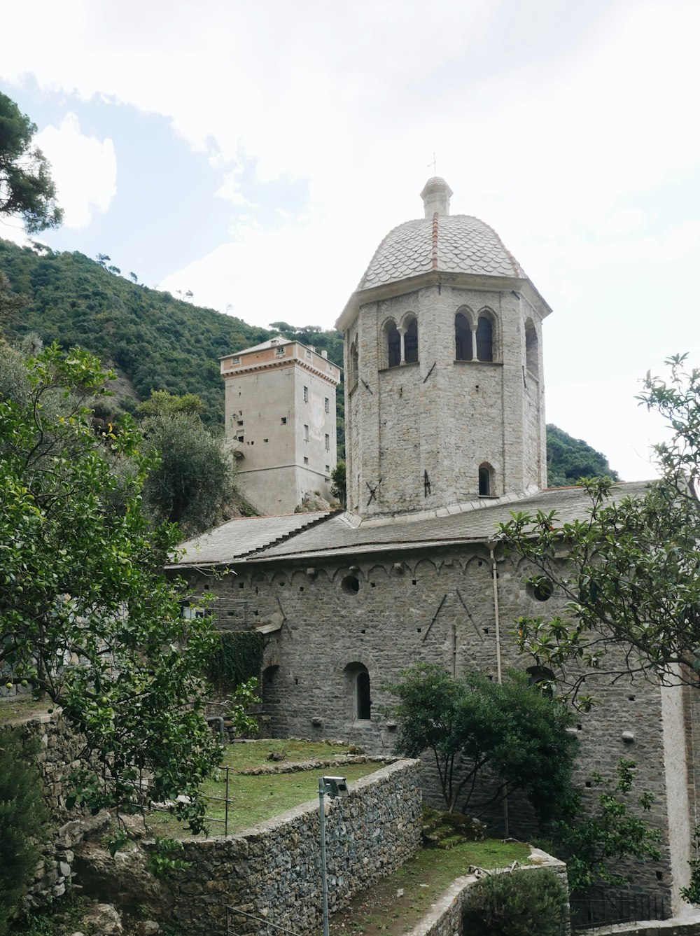 an old building with a clock tower on top of it