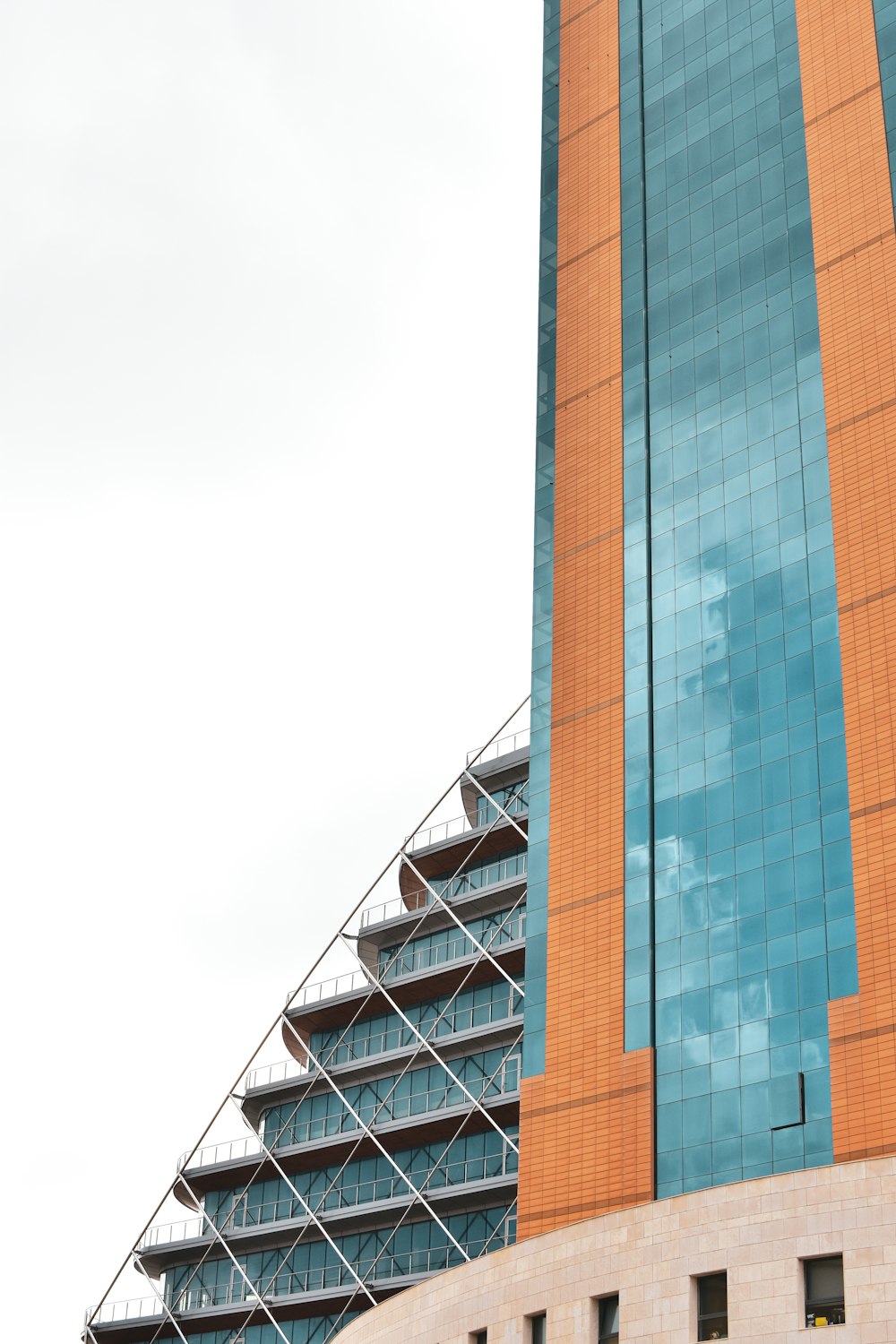 a tall building with a sky background