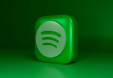a green square shaped object with a green background