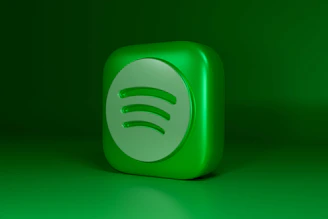 a green square shaped object with a green background