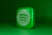 a green square shaped object with a green background