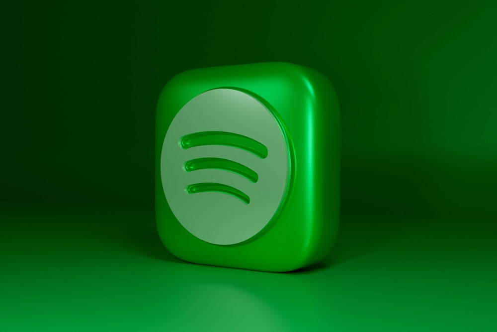 a green square shaped object with a green background